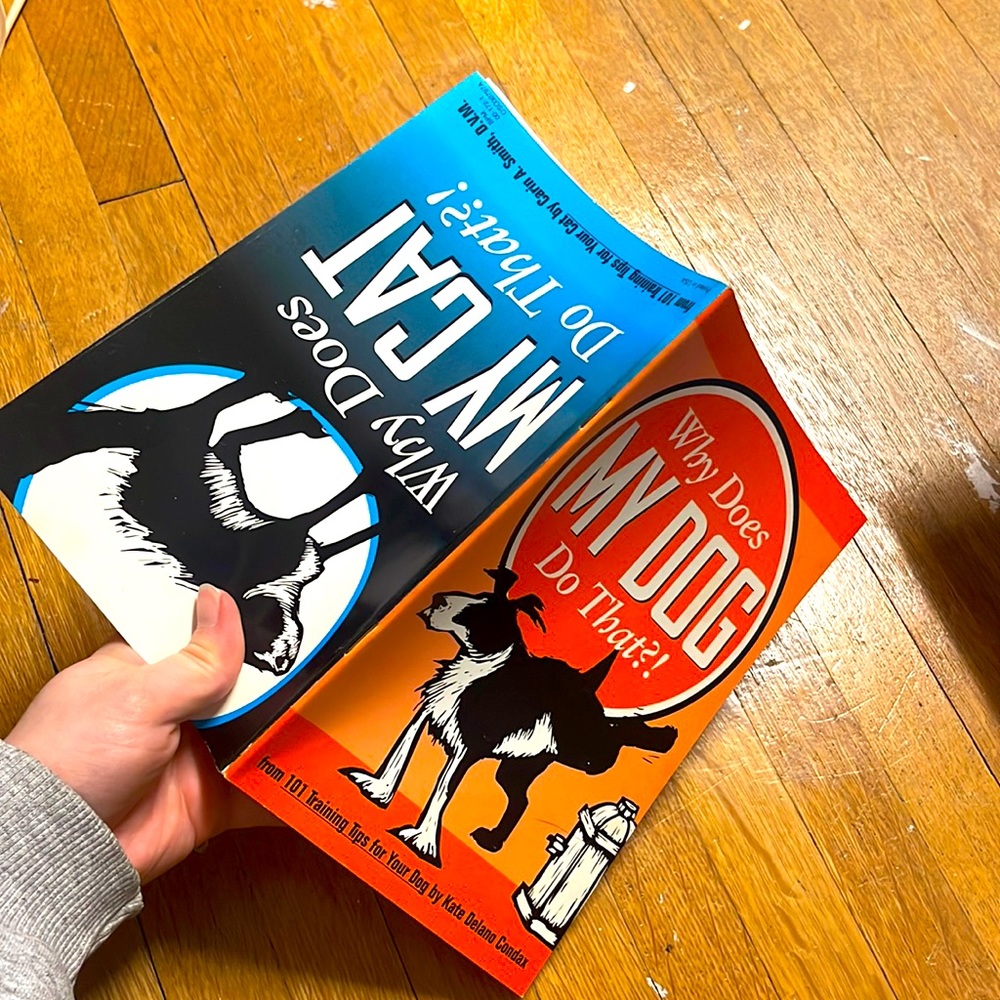 Vintage 90s Why does my cat do that?! Why does my dog do that?! Paperback book